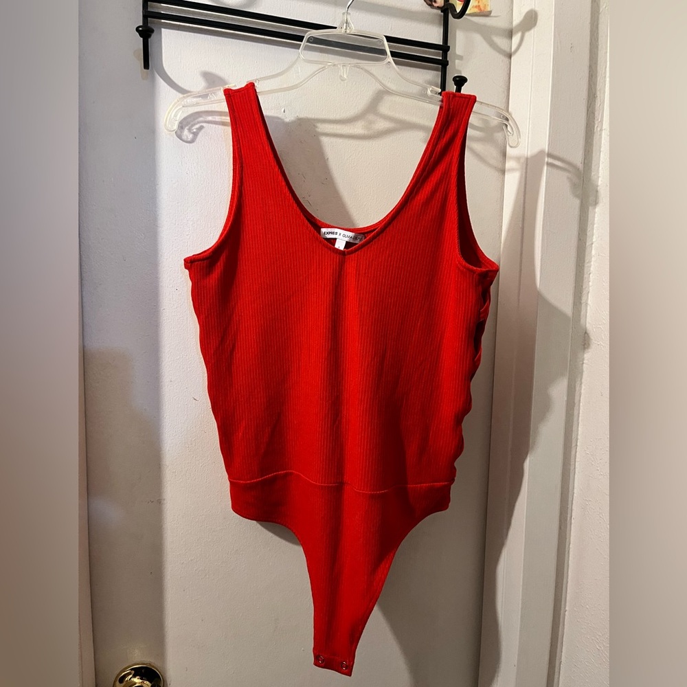 Express- size L- bright red snap bodysuit w/ X cutouts. NWOT.